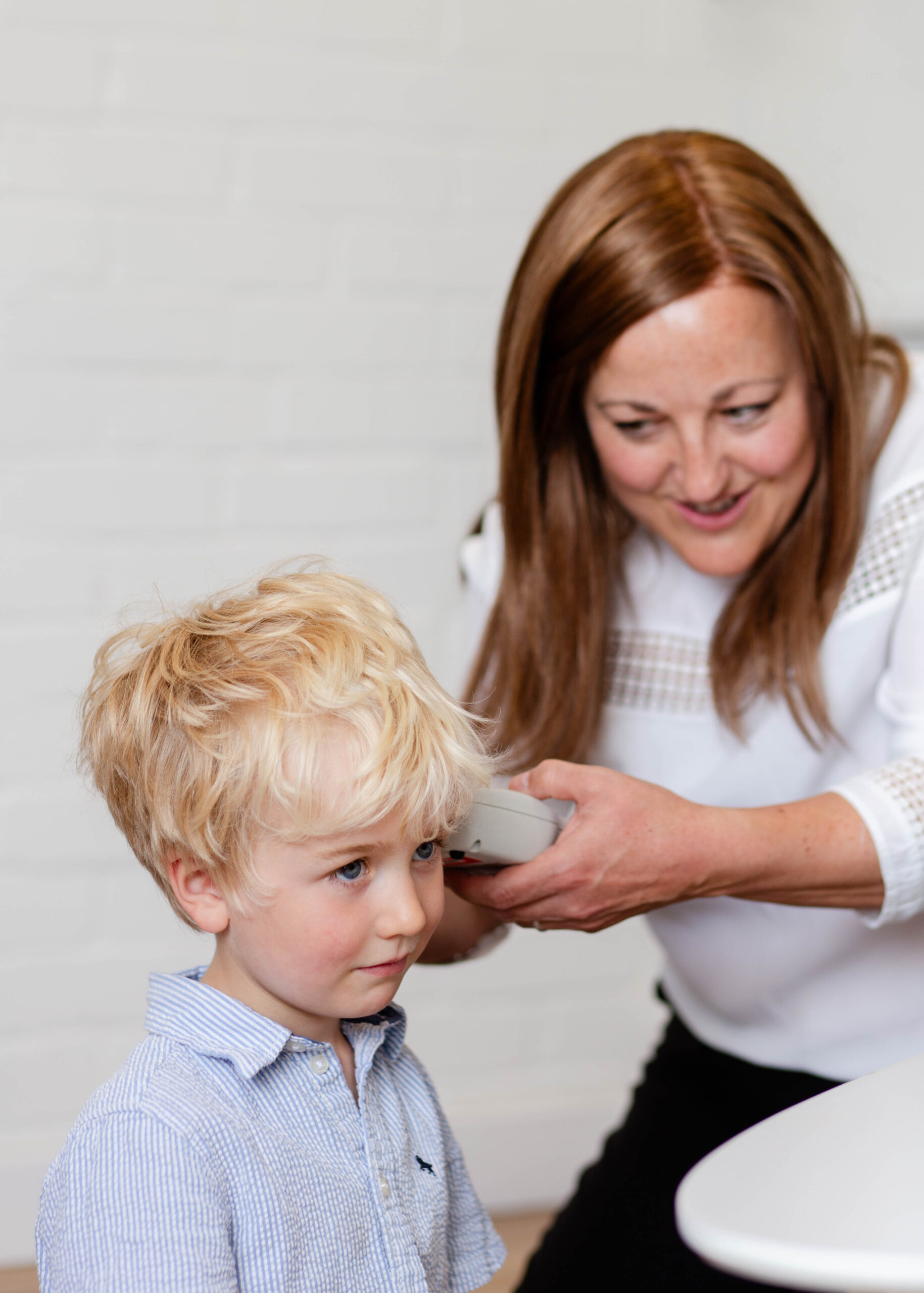 Dr. Lucy Danes Conducting a Pediatric Ear Examination at The Hearing Health Clinic