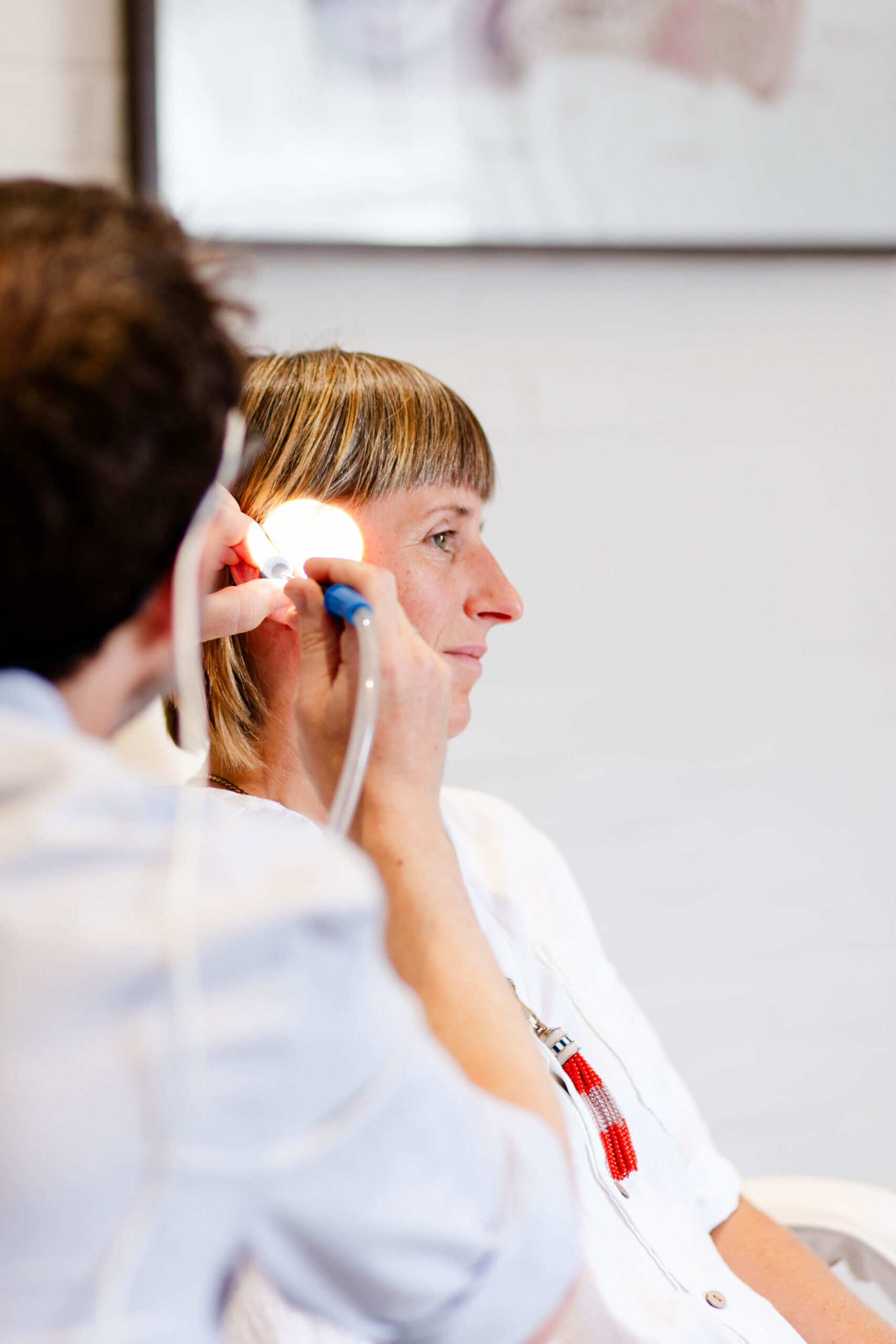 John Allen Conducting a Hearing Examination at The Hearing Health Clinic